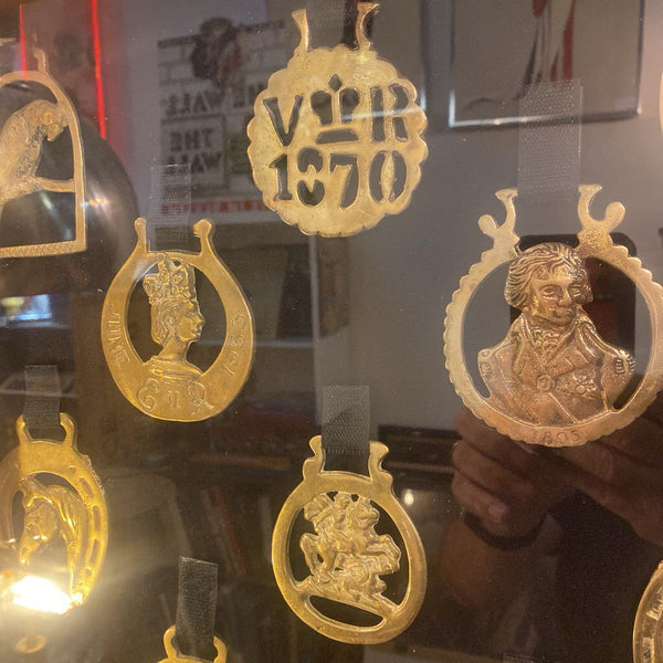 Framed British horse brasses