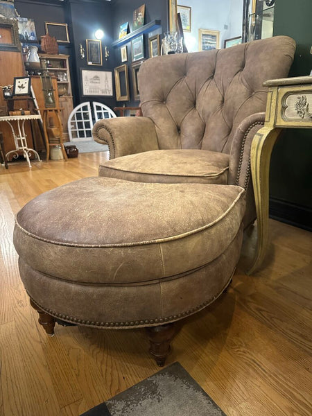 DISTRESSED LEATHER WRITER'S CHAIR AND OTTOMAN, NAILHEAD TRIM. 39"H x 37"W x 40"D, OTTOMAN DIM: 26"W x 22"D x 17"H, IN STORE PICKUP