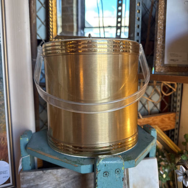 Gold and lucite ice bucket with tongs