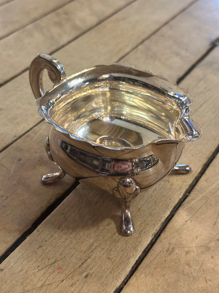 SMALL SILVER PLATED FOOTED CREAMER W/ SCALLOPED EDGE