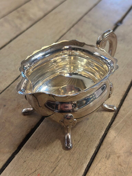 SMALL SILVER PLATED FOOTED CREAMER W/ SCALLOPED EDGE