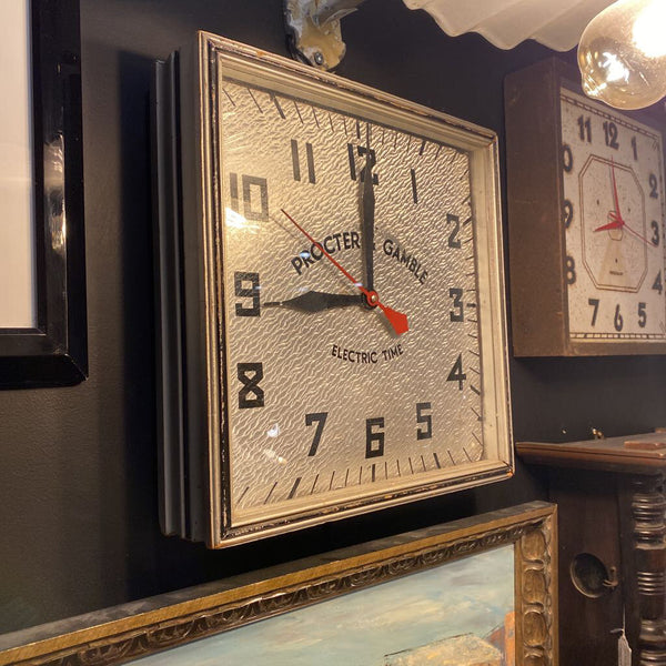 Procter and Gamble silver clock w battery operated clock